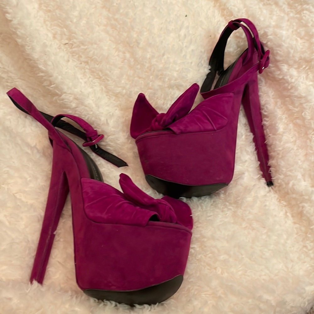 Not sure if these are real…Giuseppe Zanotti like 7 inch heels.